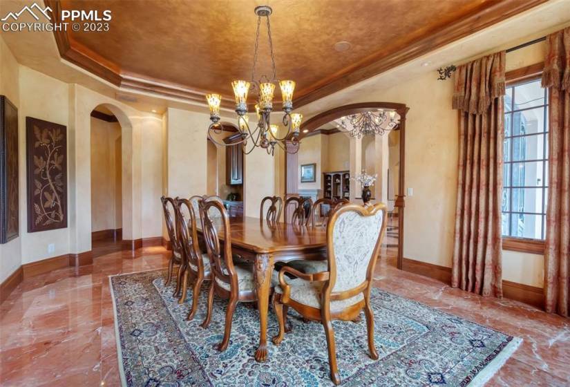 Spacious formal dining room that still flows with the rest of the home but has its own charm