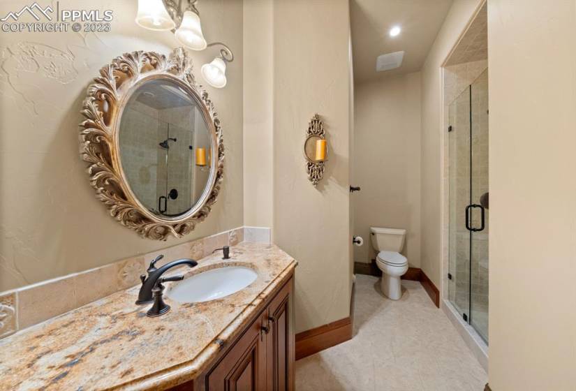 En suite bathroom thoughtfully upgraded with high end finishes