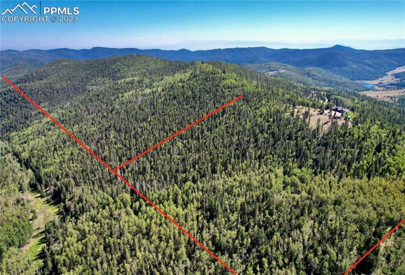Property Lines are approximate and not a survey. Lower left-hand corner of photo reflects property east border to Pike National Forest.