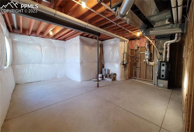 Excellent storage needs and utility area with a tankless water heater, 96% energy efficient furnace with a variable speed motor, sealed ducts, pex water piping, and sprinkler stub in this energy rated home!