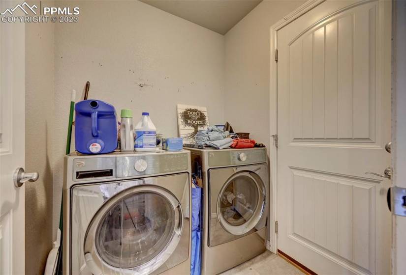 laundry room enters 2 car garage.  washer and dryer 