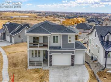 Eastleigh II-Prairie Elevation-2 Story-4 Car Tandem Garage-Covered Front Balcony and Porch-Energy Rated-Desirable Highline at Wolf Ranch Community!