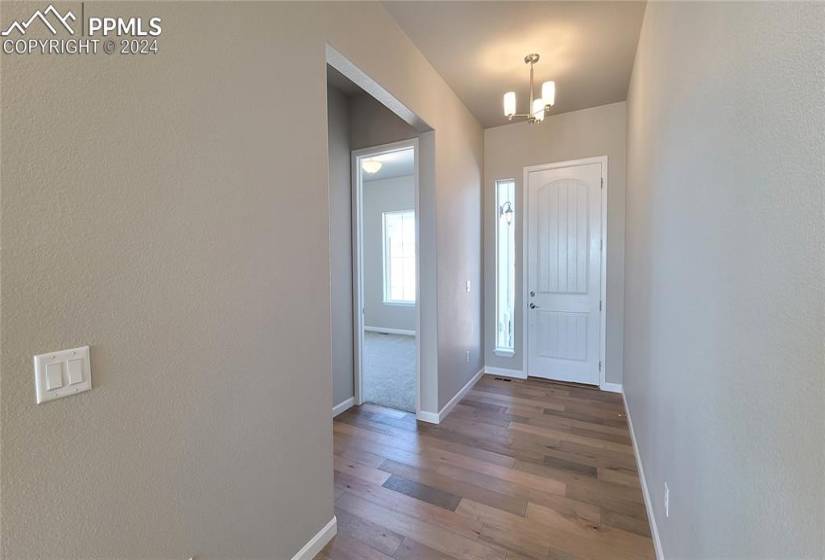 Welcome Home! Inviting Entryway with engineered wood flooring!