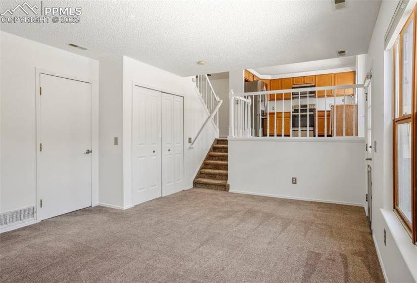 The attached garage access and laundry are located off of the family room. Extra storage from the crawl space in the garage!