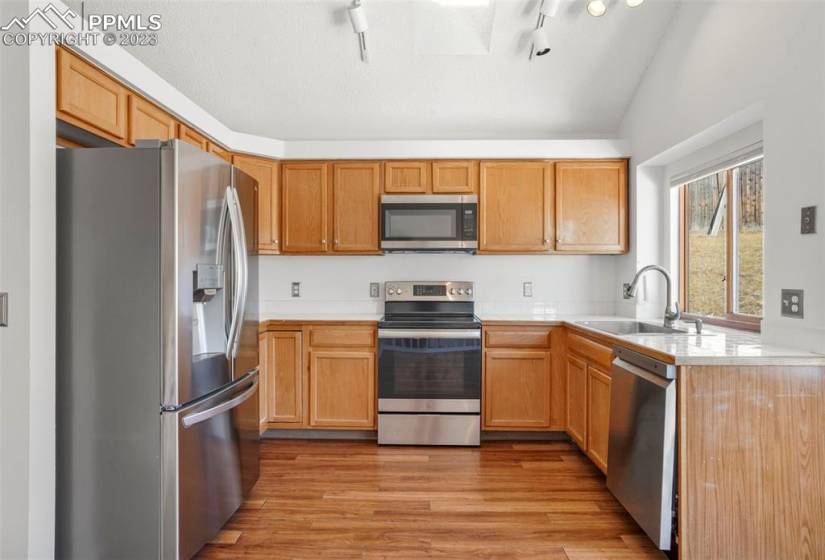 Newer stainless steel appliances complete the kitchen.