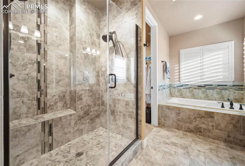 Spa like master bath with large walk in shower that feaures dual shower heads. Large soaking tub, walk in closet and double vanity.