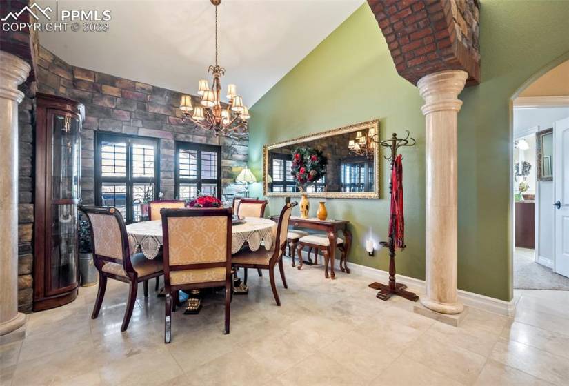 Dining room accented with stone & brick