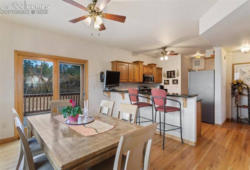 Sliding glass door off of dining room to deck area for outdoor entertaining