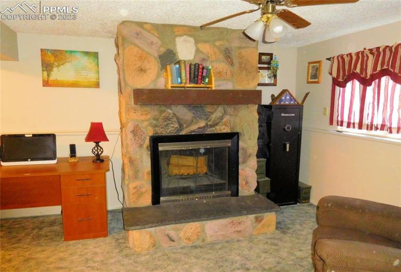 Family room and wood burning fireplace