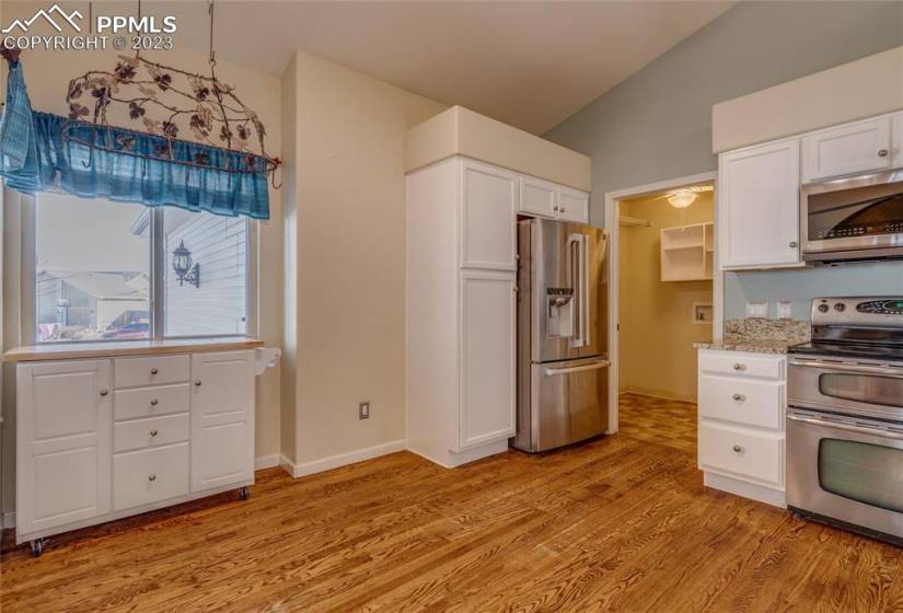 Eat in kitchen with adjacent laundry room and exit to the garage