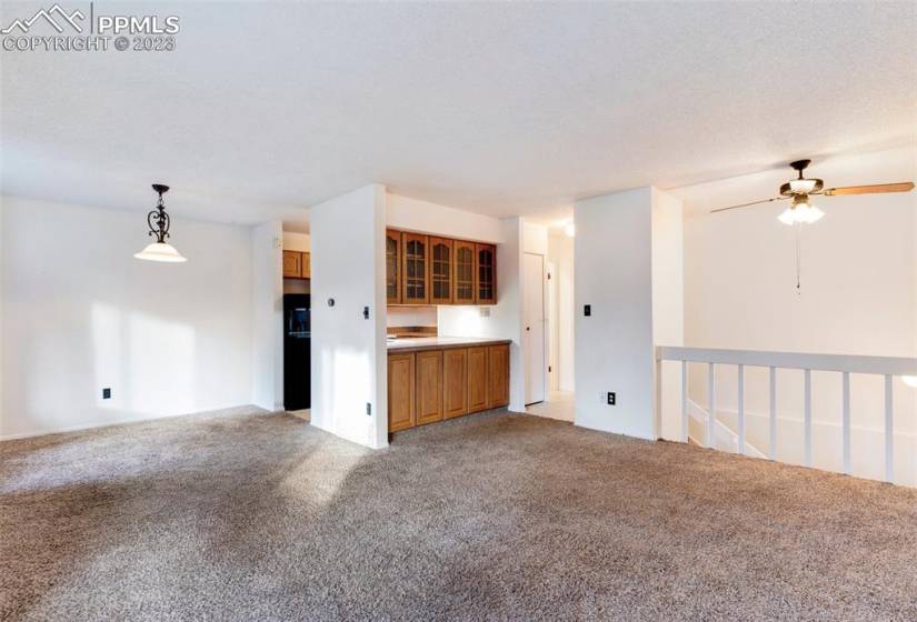 Living/Dining Room with view of Kitchen entry.