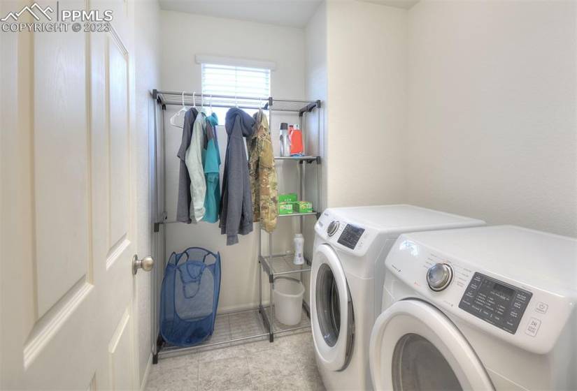 Laundry is located on the upper level convenient to the 3 bedrooms and has a window for natural light.