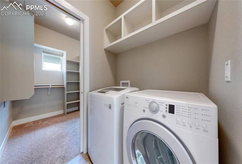 Washer and dryer right outside of walk-in closet. Washer and dryer are included in sale!