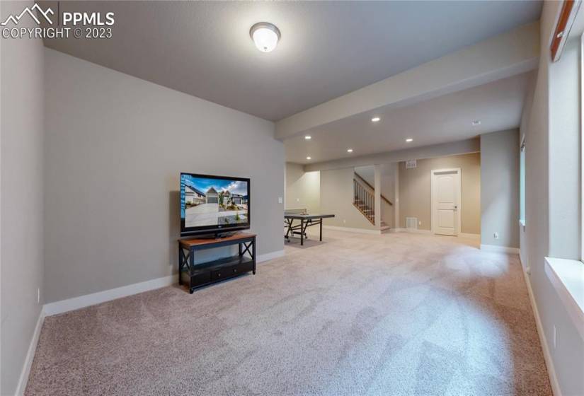 Huge basement for movies, games & a home gym.