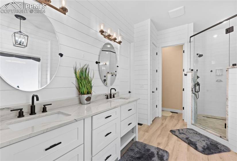 Remodeled five piece primary bath with walk in closet