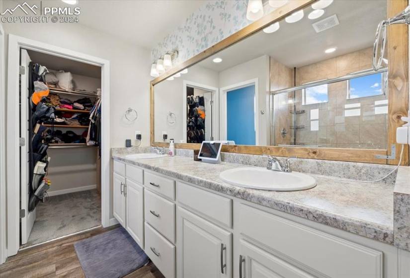Dual sink vanity and walk in closet in Primary Owner's Suite