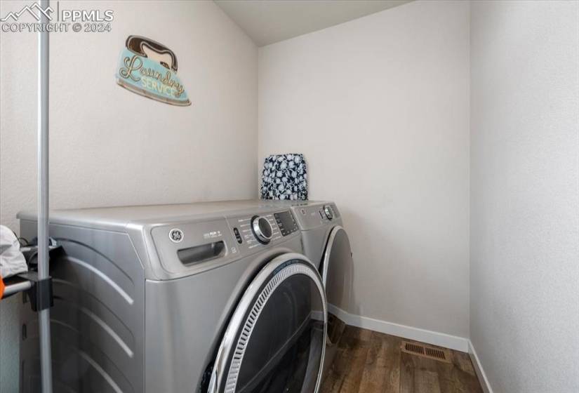 Upper Level Laundry Room with washer and dryer that stay