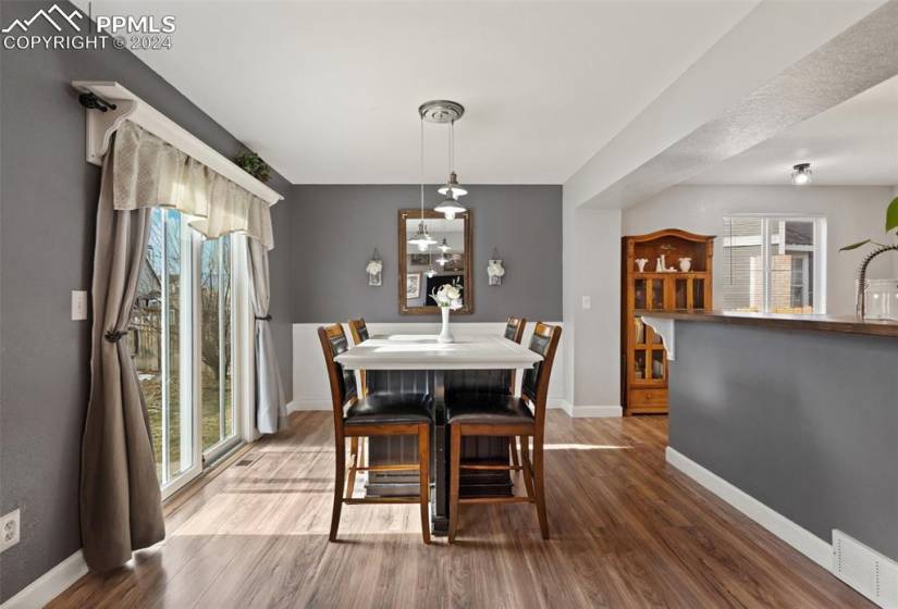Bright informal Dining Area with slider to spacious back patio.