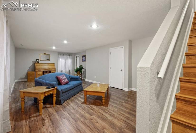 Generously sized Basement Family/Rec Room boasts new laminate flooring.