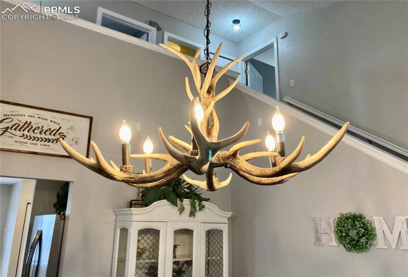 YES, that's an antler chandelier lighting the formal Dining Room!