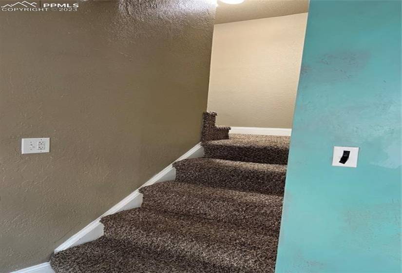 Stairs going to bedrooms