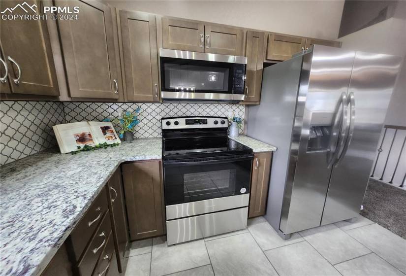Brand new stainless steel appliances that are included.