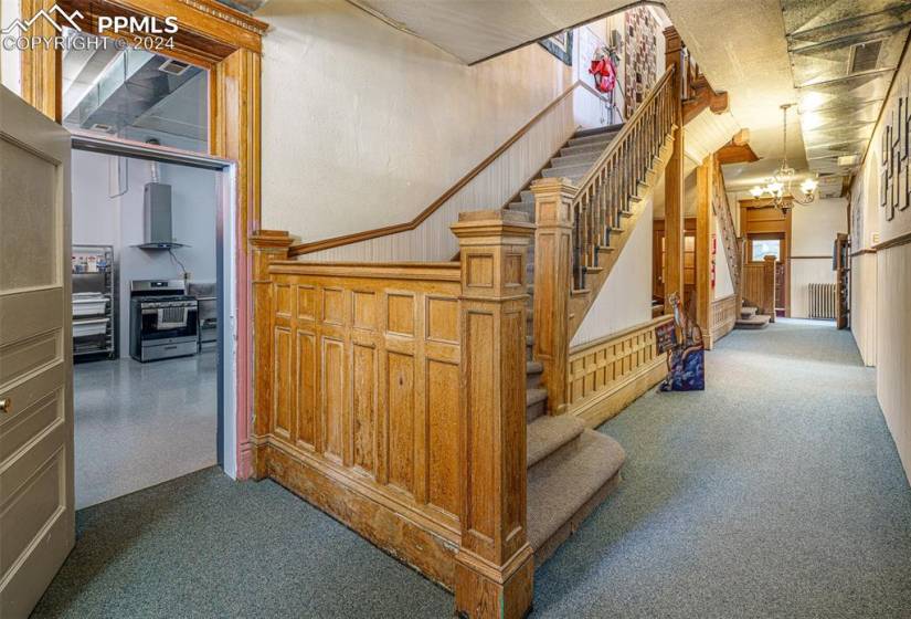 Love this stairwell just of the main level kitchen and leading to the upper level.