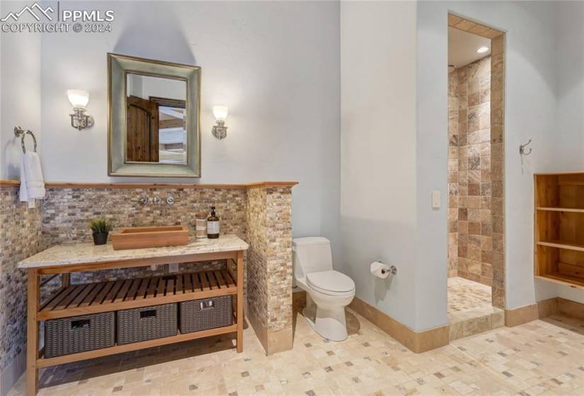 Pool bathroom with double shower and a convenient pass through to laundry for wet items!