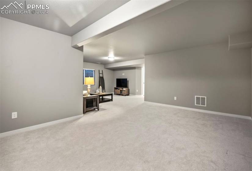 Great basement space with two areas, one for pool table or activities and one for relaxing and watching movies!