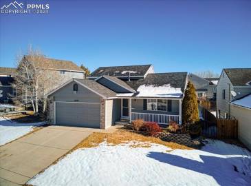 Beautifully maintained 4-level home in the  quiet, established neighborhood of RIdgeview at Stetson Hills.