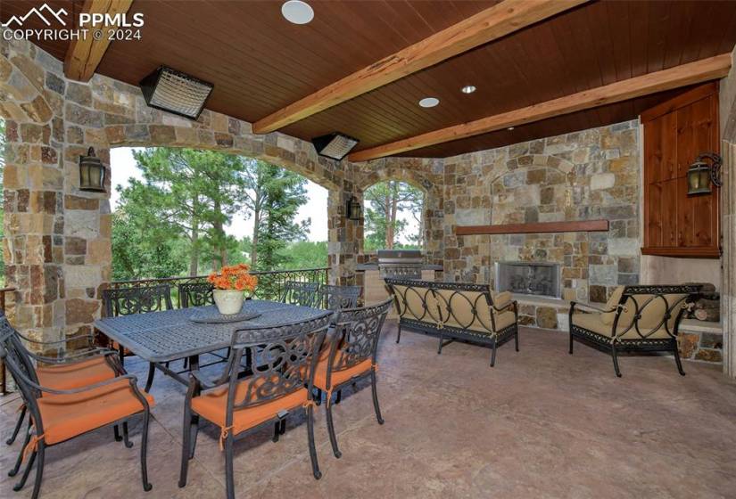 View of patio featuring exterior kitchen and grilling area