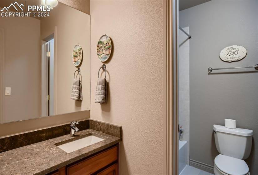 Second floor full bathroom featuring shower / bathtub combination, & vanity.
