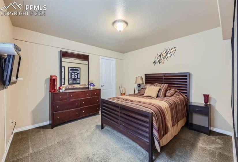 Basement bedroom with large walk in closet