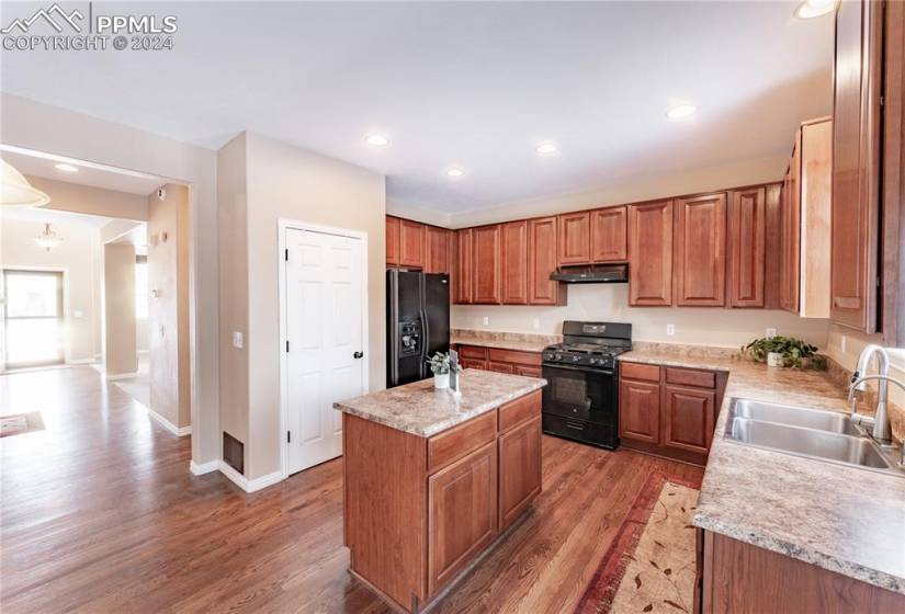 Kitchen with open floor plan, island and gas range!