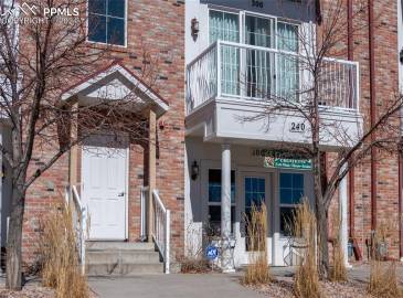 Property entrance featuring a balcony