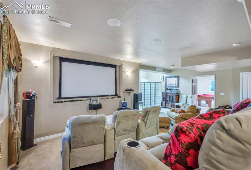 Enjoy a movie night with family and friends in this well-equiped theater room