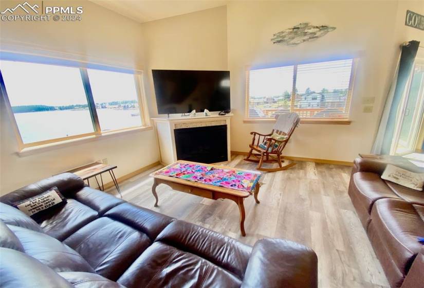 Living room with light wood-type flooring