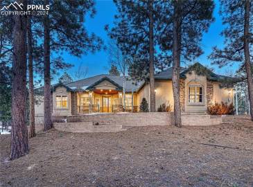 Custom ranch home on 5.6 acres in Black Forest!
