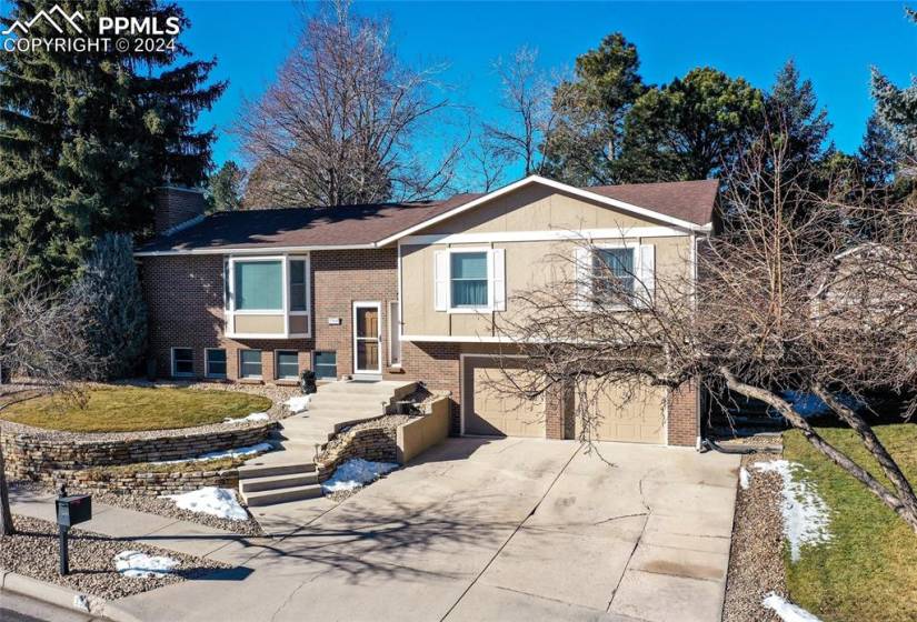 Beautiful Split Level Home with newly meticulously landscaped Front Yard