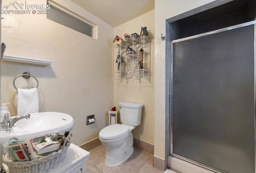 This 3/4 bath has a spacious shower and room to relax and get ready for the day.