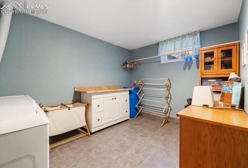 The laundry room is big enough to handle the needs of the busiest households.