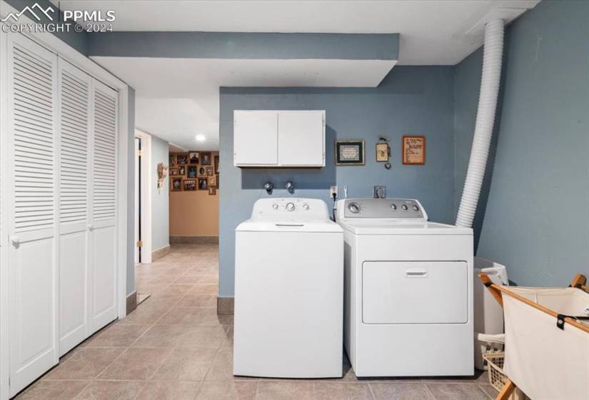 Tile floors and lots of storage make this laundry room a joy to use.
