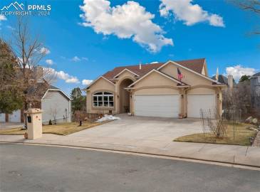 Gorgeous Rancher in a Most Desirable Location Features Main Level Living, a 3 Car Garage and Spectacular Views!
