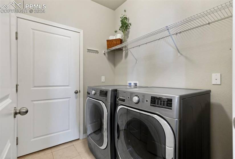 Laundry Room Off The Garage With Extra Storage