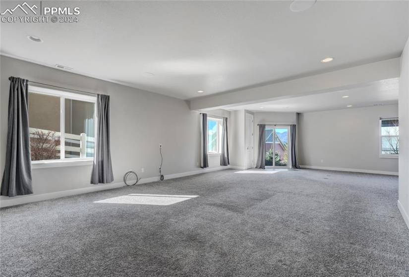 Walkout Basement Boasts Spacious Recreation Room with Additional Flex Space Ideal for Gaming/Billiards/Play/Study/Office/Exercise, Built-in Surround Sound + Above Grade Windows for an Abundance of Natural Light