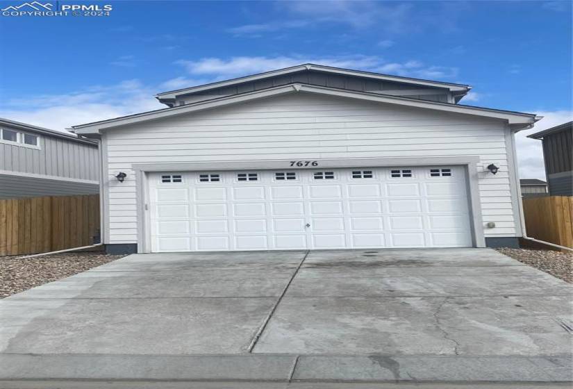 This home has an attached 2 car garage with additional parking space in the driveway!! The door is freshly painted!
