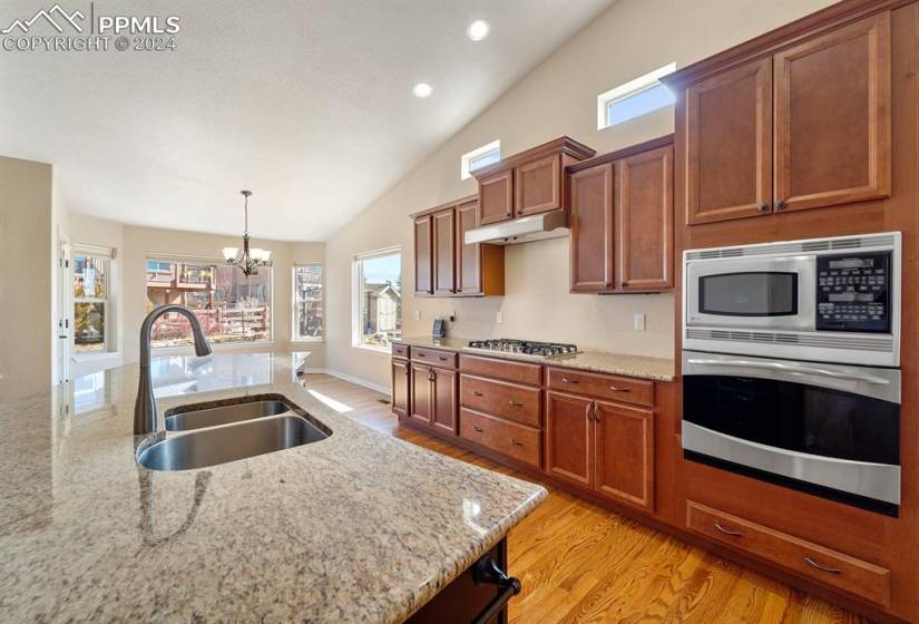 Kitchen with large island and stainless appliances