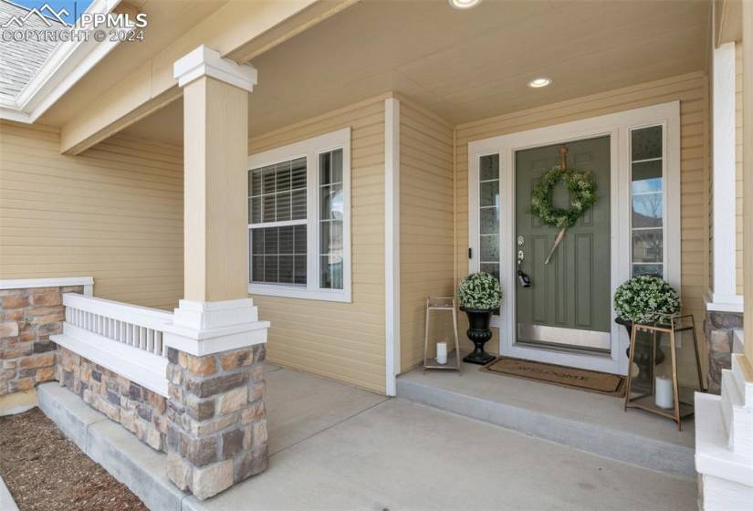 Property entrance featuring covered porch