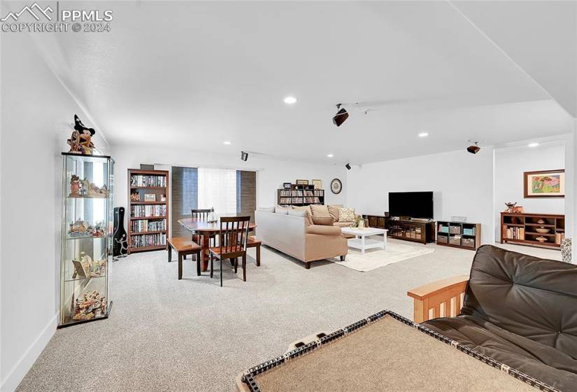 View of carpeted basement family room
