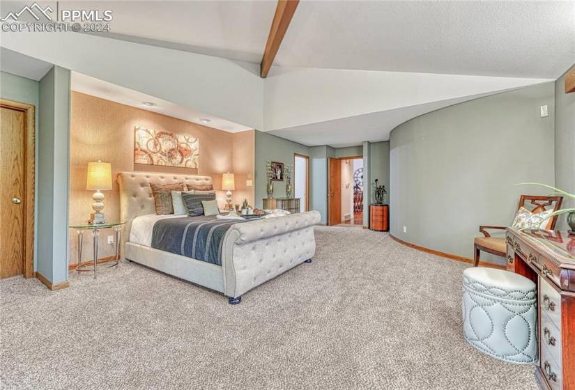 Spacious Master Bedroom With New Carpet